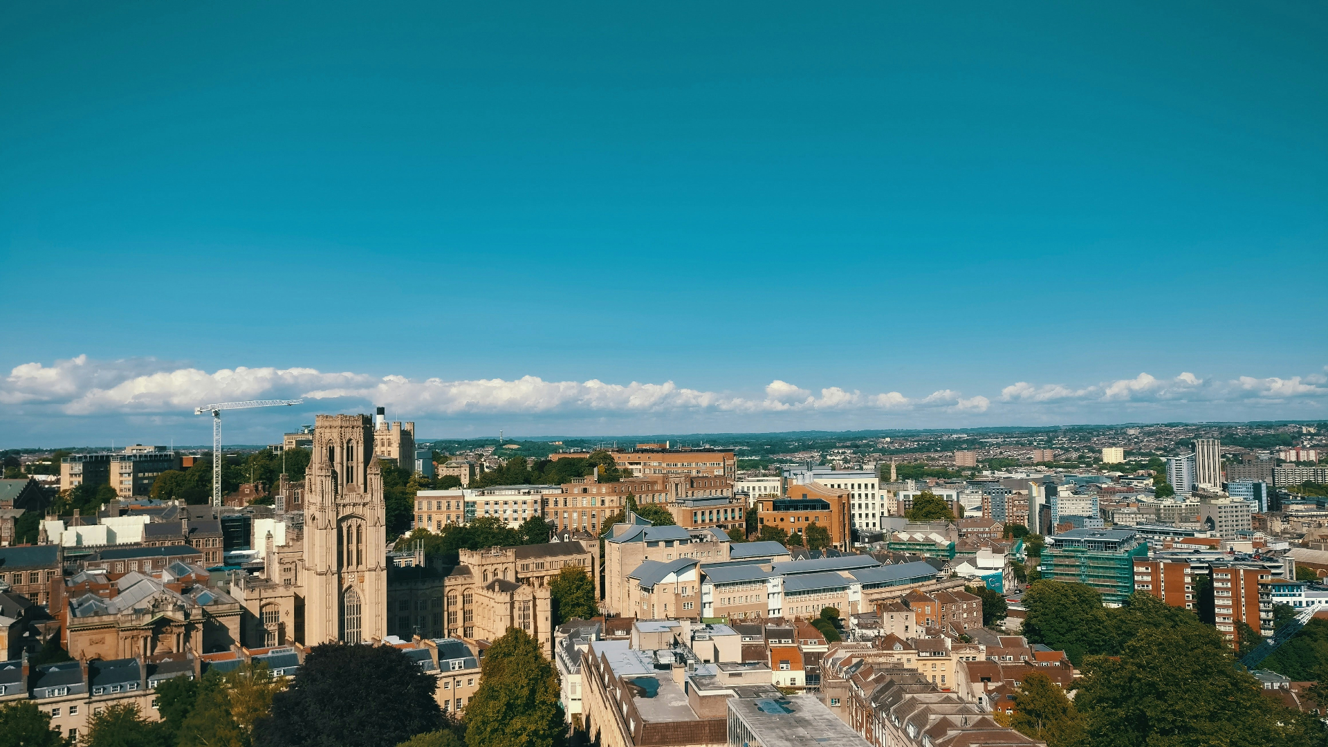 Aerial view of Bristol skyline with the Wills Memorial Building tower rising above the city
